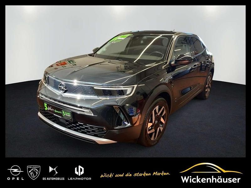 Diamant schwarz/karbon schwarz Gebraucht 2022 Opel Mokka-e Elegance SUV | 16.490 € (Guter Preis) - Bild 1/4