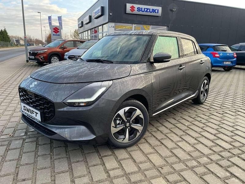Mineral gray Gebraucht 2024 Suzuki Swift Comfort+ Limousine | 17.995 € (Fairer Preis) - Bild 1/4