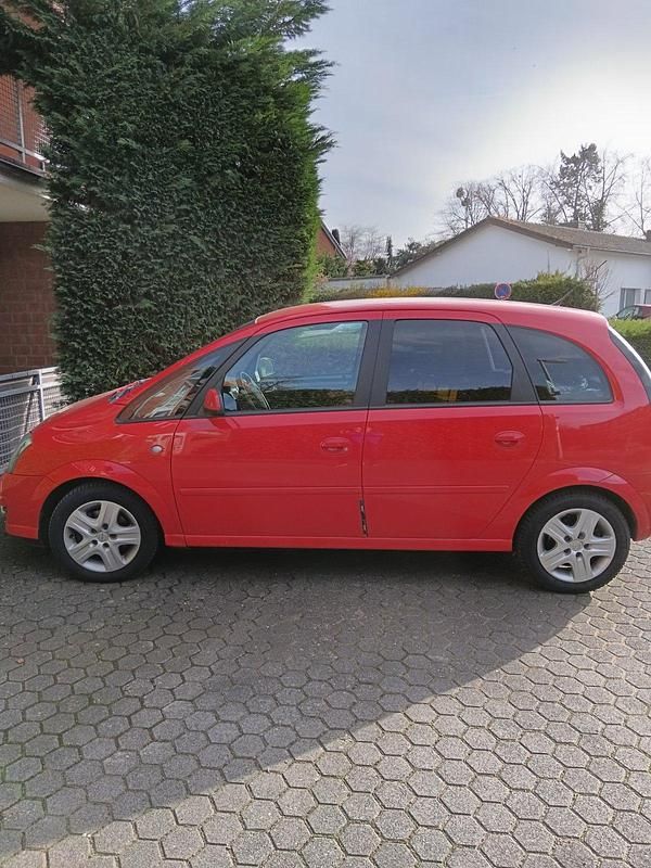 Second-hand Opel Meriva 90 CP (66 kW) 2010 Roșu Monovolum