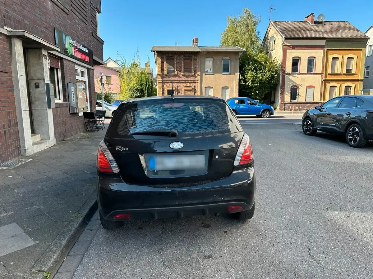 Gebraucht Kia Rio 97 PS (71 kW) 2010 Schwarz Kleinwagen