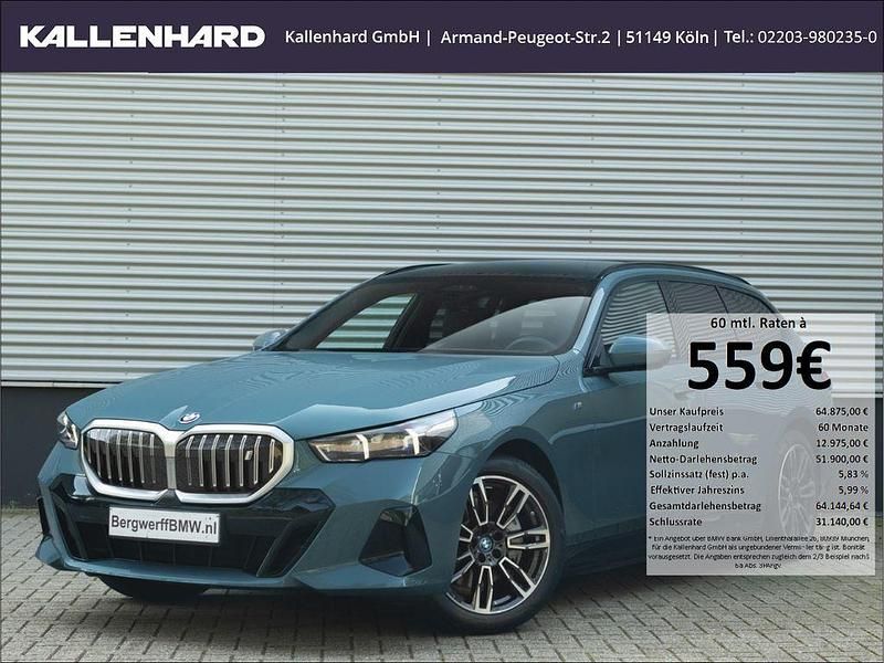 Gruen Gebraucht 2024 BMW i5 M Sport Limousine | 64.875 € - Bild 1/4