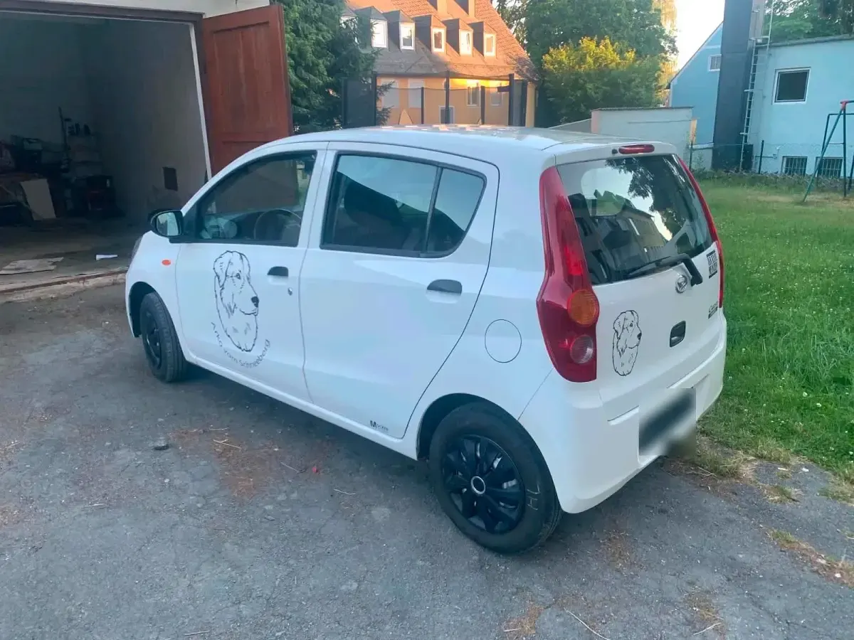 Gebraucht Daihatsu Cuore 70 PS (51 kW) 2010 Weiß Kleinwagen