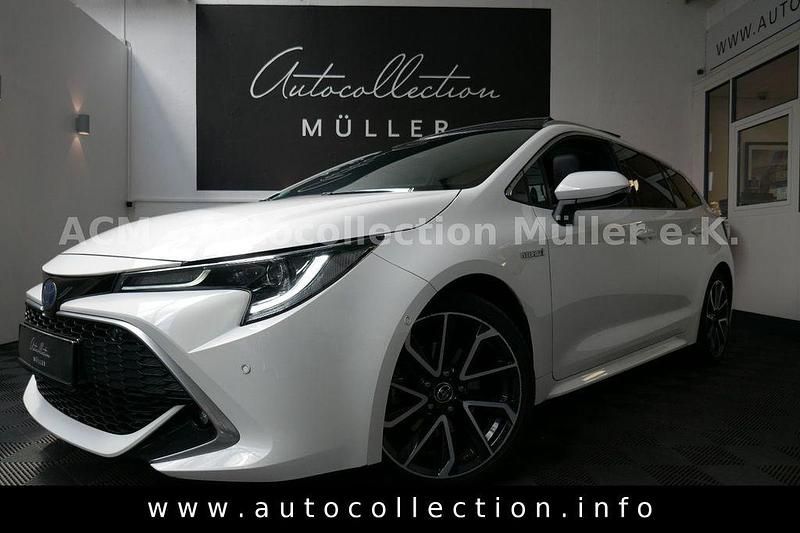 Super (pure) white ii (metallic) Gebraucht 2019 Toyota Corolla Lounge Kombi | 21.997 € (Fairer Preis) - Bild 1/4