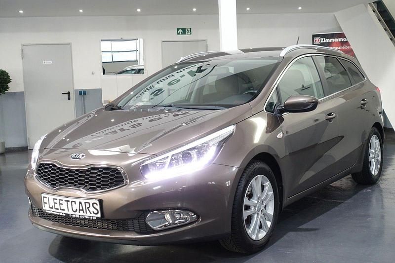 Braun Gebraucht 2015 Kia Ceed Sportswagon DREAM-TEAM Edition Kombi | 8.850 € (Fairer Preis) - Bild 1/4