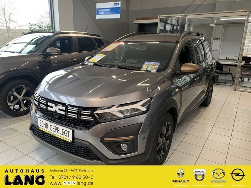 Schiefergrau Gebraucht 2024 Dacia Jogger Extreme Van / Kleinbus | 23.990 € (Fairer Preis) - Bild 1/4