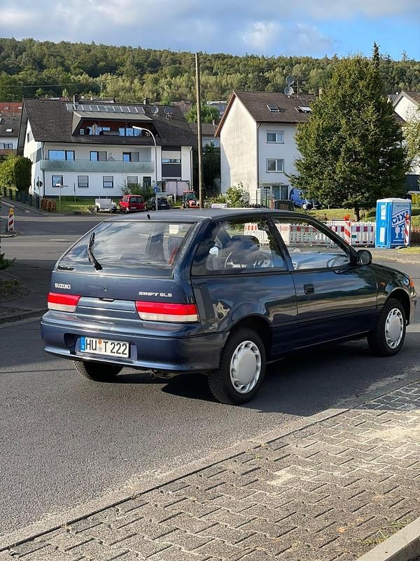 Blau Gebraucht 1994 Suzuki Swift GLS Kleinwagen | 2.175 € - Bild 1/4