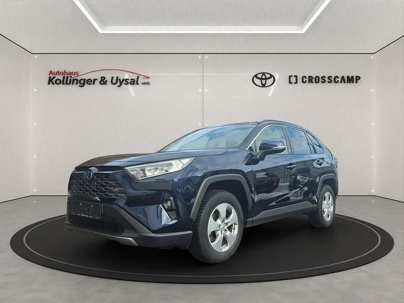 Dark blue metallic Gebraucht 2022 Toyota RAV4 Hybrid Team SUV | 30.490 € (Superpreis) - Bild 1/4