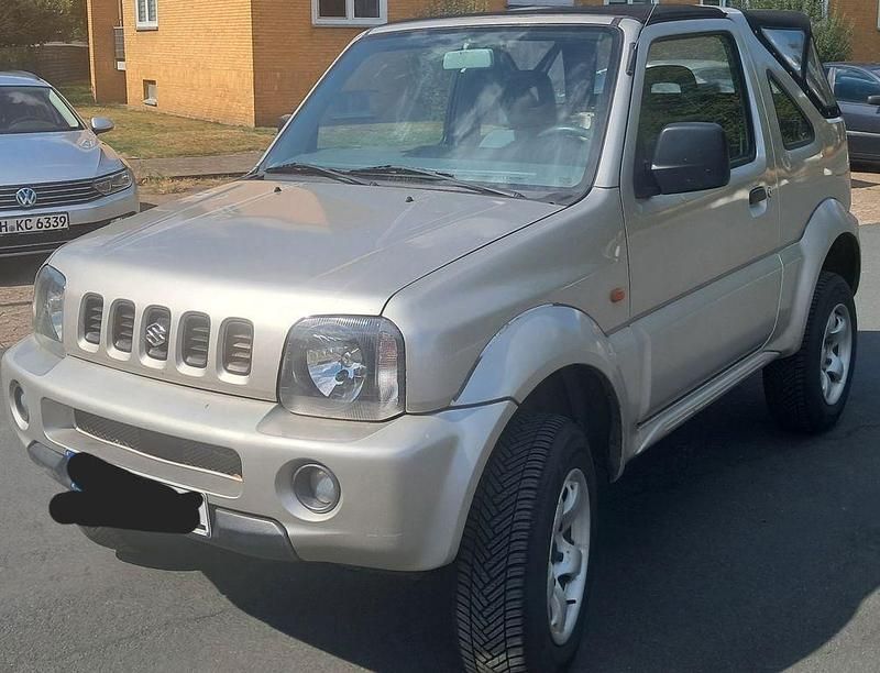 Gold Gebraucht 2005 Suzuki Jimny Club SUV | 7.700 € (Etwas zu teuer) - Bild 1/4