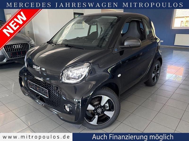 Schwarz Gebraucht 2024 Smart ForTwo Electric Drive Exclusive Kleinwagen | 17.467 € (Fairer Preis) - Bild 1/4