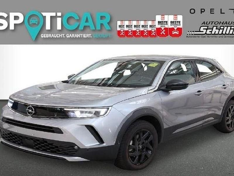 Quarz grau Gebraucht 2023 Opel Mokka-e Elegance SUV | 20.690 € (Fairer Preis) - Bild 1/2