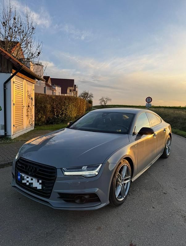 Grau Gebraucht 2016 Audi A7 Competition Limousine | 26.499 € (Superpreis) - Bild 1/4
