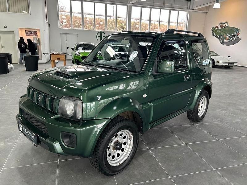 Grün Gebraucht 2013 Suzuki Jimny Ranger SUV | 13.450 € (Teuer) - Bild 1/4