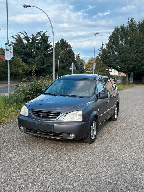Grau Gebraucht 2003 Kia Carens Van / Kleinbus | 1.500 € - Bild 1/4