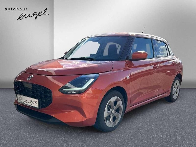 Flame orange pearl metallic Gebraucht 2025 Suzuki Swift Comfort Kleinwagen | 15.268 € (Fairer Preis) - Bild 1/3