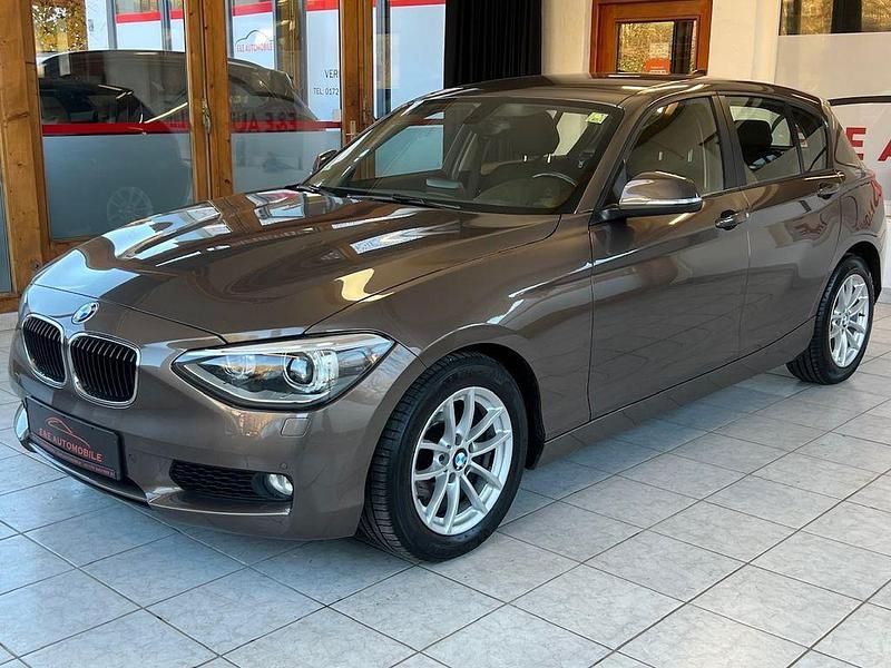 Braun Gebraucht 2013 BMW 116 Advantage Kleinwagen | 11.500 € (Etwas zu teuer) - Bild 1/4