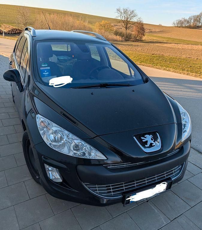 Schwarz Gebraucht 2011 Peugeot 308 SW Kombi | 3.350 € - Bild 1/4