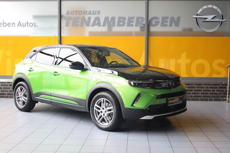 Grün Gebraucht 2021 Opel Mokka-e Ultimate SUV | 21.900 € (Teuer) - Bild 1/4