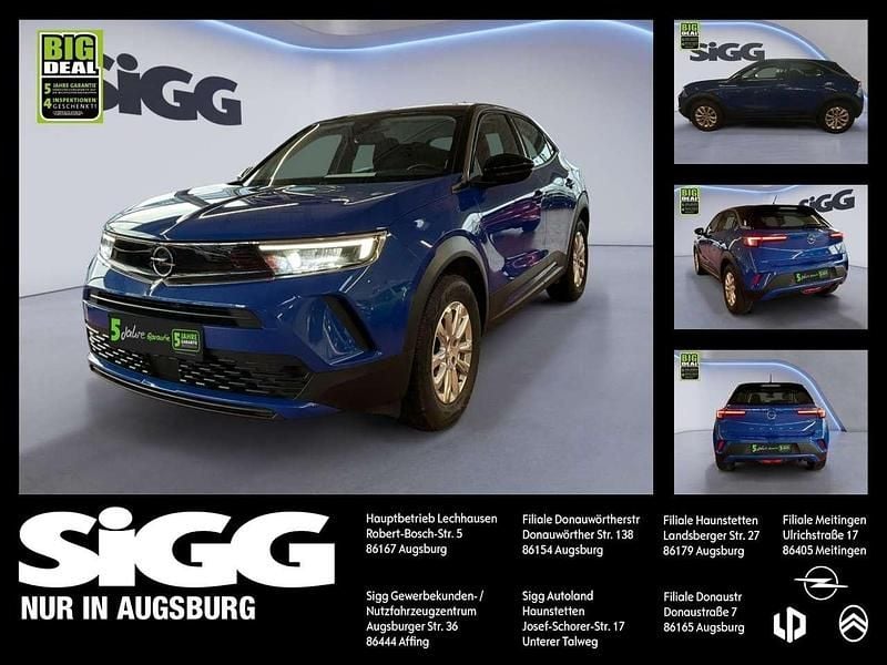 Perl blau/voltaik blau (metallic) Gebraucht 2022 Opel Mokka Edition SUV | 13.580 € (Superpreis) - Bild 1/4