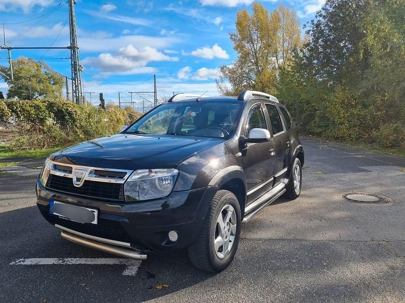 Braun Gebraucht 2011 Dacia Duster Prestige SUV | 5.999 € (Fairer Preis) - Bild 1/4