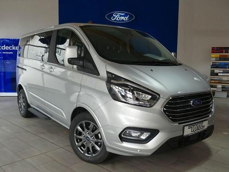 Moondustsilber metallic Gebraucht 2023 Ford Tourneo Custom Van / Kleinbus | 51.884 € - Bild 1/4