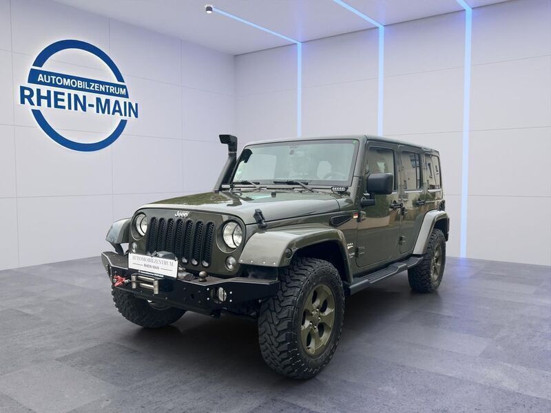 Grün Gebraucht 2016 Jeep Wrangler Sahara SUV | 34.500 € (Teuer) - Bild 1/4