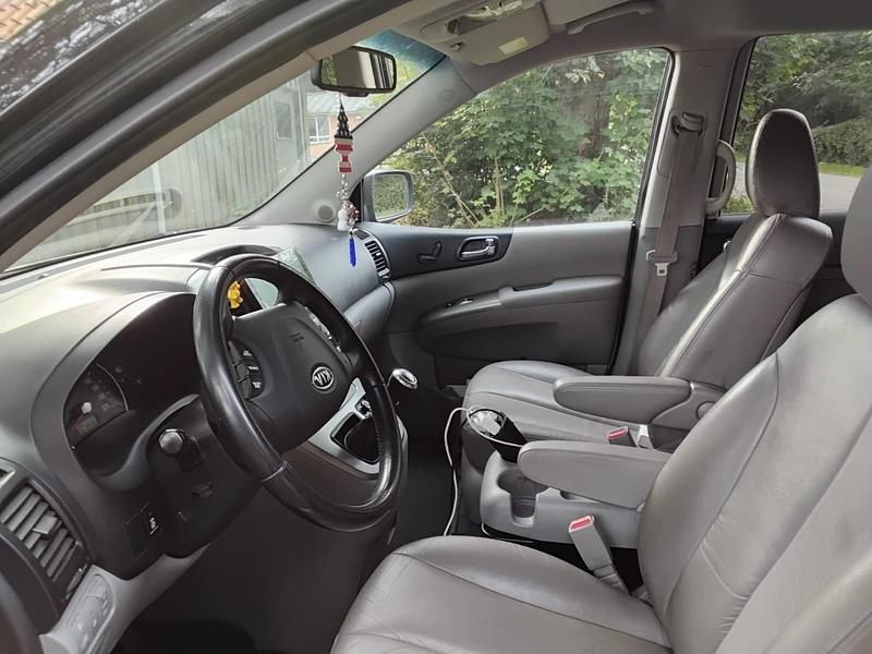 Gebraucht Kia Carnival 185 PS (136 kW) 2009 Schwarz Van / Kleinbus