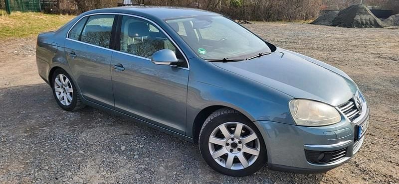 Second-hand VW Jetta 130 CP (95 kW) 2006 Verde Berlinǎ