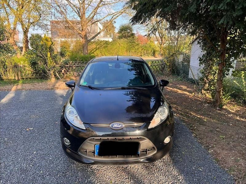 Gebraucht Ford Fiesta Titanium 101 PS (74 kW) 2012 Schwarz Kleinwagen