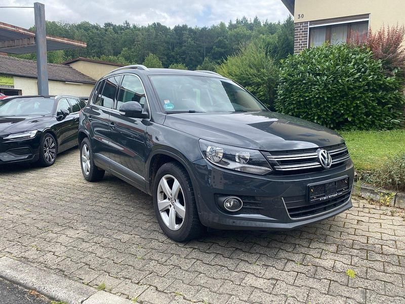 Grau Gebraucht 2014 VW Tiguan SUV | 11.000 € (Teuer) - Bild 1/4