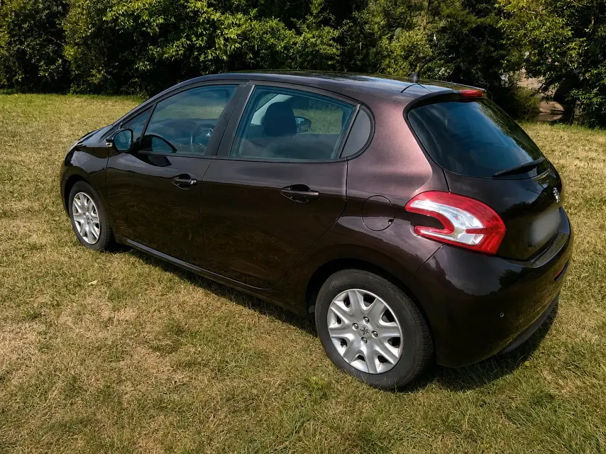 Gebraucht Peugeot 208 Style 82 PS (60 kW) 2013 Braun Kleinwagen