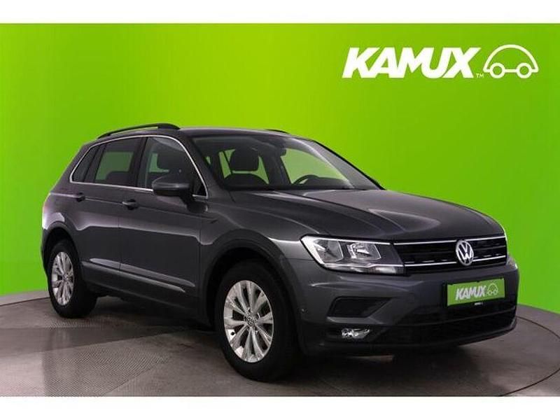 Indiumgrau Gebraucht 2018 VW Tiguan Comfortline SUV | 22.390 € (Superpreis) - Bild 1/3