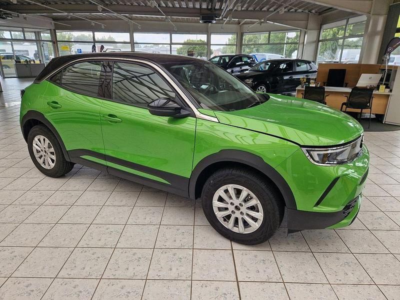 Grün Gebraucht 2024 Opel Mokka-e Elegance SUV | 29.980 € - Bild 1/4