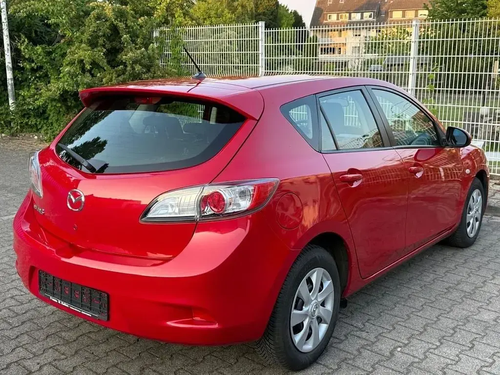 Używany Mazda 3 Active 105 KM (77 kW) 2013 Czerwony Sedan/Limuzyna