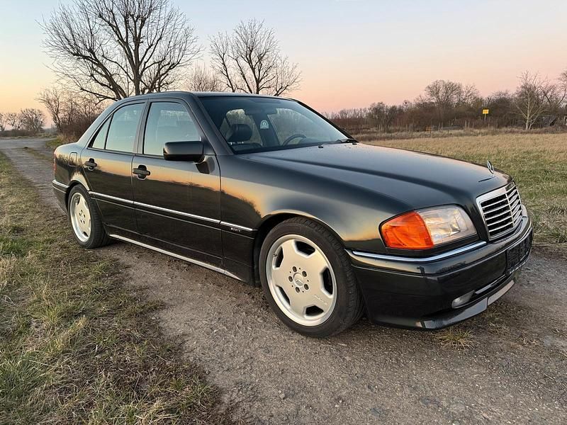 Schwarz Gebraucht 1995 Mercedes C280 AMG Limousine | 10.990 € - Bild 1/4