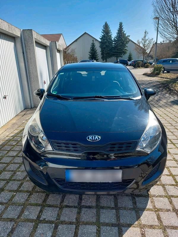 Gebraucht Kia Rio 109 PS (80 kW) 2011 Schwarz Kleinwagen