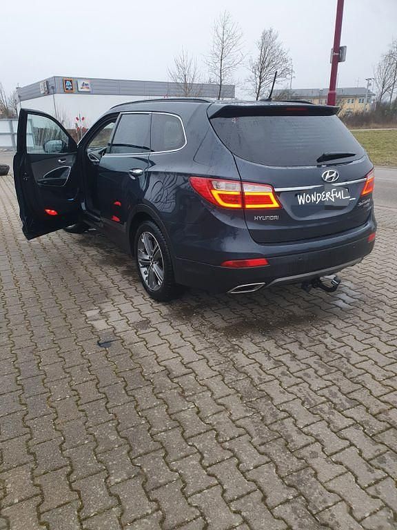 Violet Gebraucht 2014 Hyundai Grand Santa Fe Premium SUV | 13.000 € (Fairer Preis) - Bild 1/4
