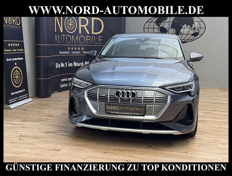 Grau Gebraucht 2021 Audi e-tron S-Line SUV | 33.900 € (Superpreis) - Bild 1/3
