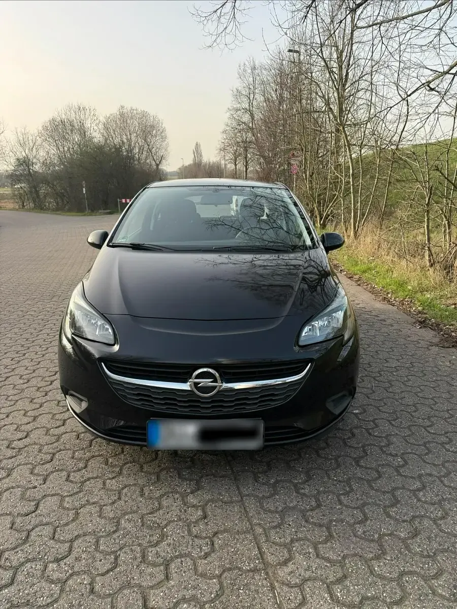 Używany Opel Corsa 69 KM (50 kW) 2016 Czarny Hatchback