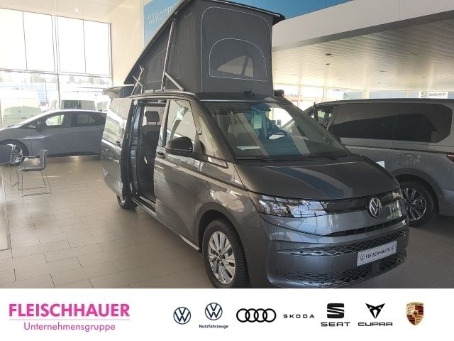 Grau Neu 2024 VW T7 Beach Van | 79.990 € - Bild 1/4
