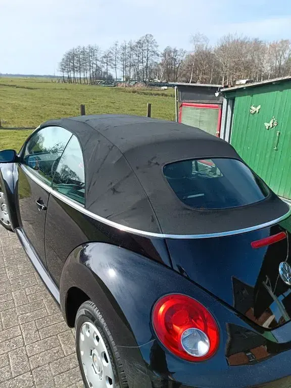 Gebraucht VW New Beetle 75 PS (55 kW) 2005 Schwarz Kleinwagen
