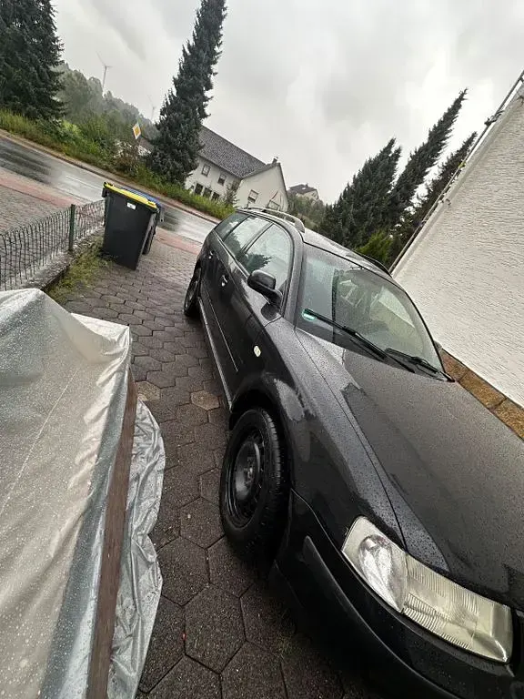 Gebraucht VW Passat Basis 101 PS (74 kW) 1998 Schwarz Kombi