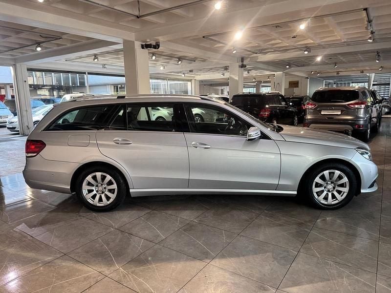 Second-hand Mercedes E250 204 CP (150 kW) 2014 Argintiu Berlinǎ