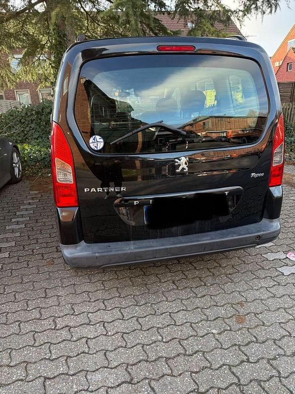 Gebraucht Peugeot Partner Tepee Family 109 PS (80 kW) 2009 Schwarz Van / Kleinbus