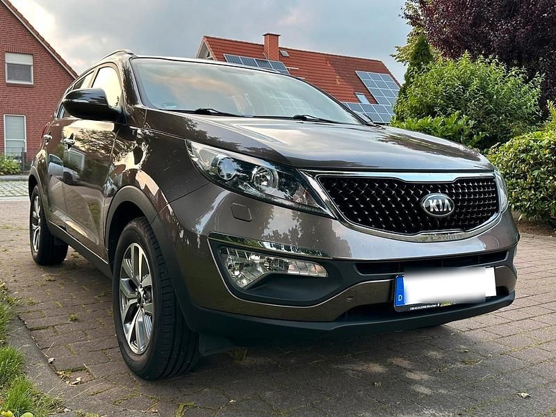Braun Gebraucht 2015 Kia Sportage Vision SUV | 12.500 € (Fairer Preis) - Bild 1/4