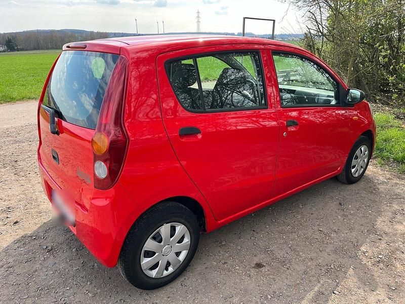 Gebraucht Daihatsu Cuore 69 PS (50 kW) 2011 Rot Kleinwagen