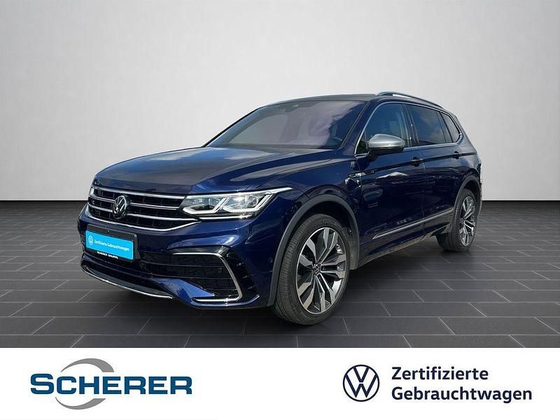 Atlantic blue metallic (metallic) Gebraucht 2022 VW Tiguan Allspace R-line SUV | 38.870 € (Etwas zu teuer) - Bild 1/4