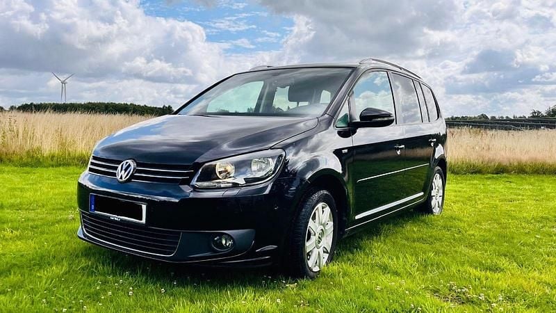 Schwarz Gebraucht 2013 VW Touran Life Van / Kleinbus | 6.900 € (Superpreis) - Bild 1/4
