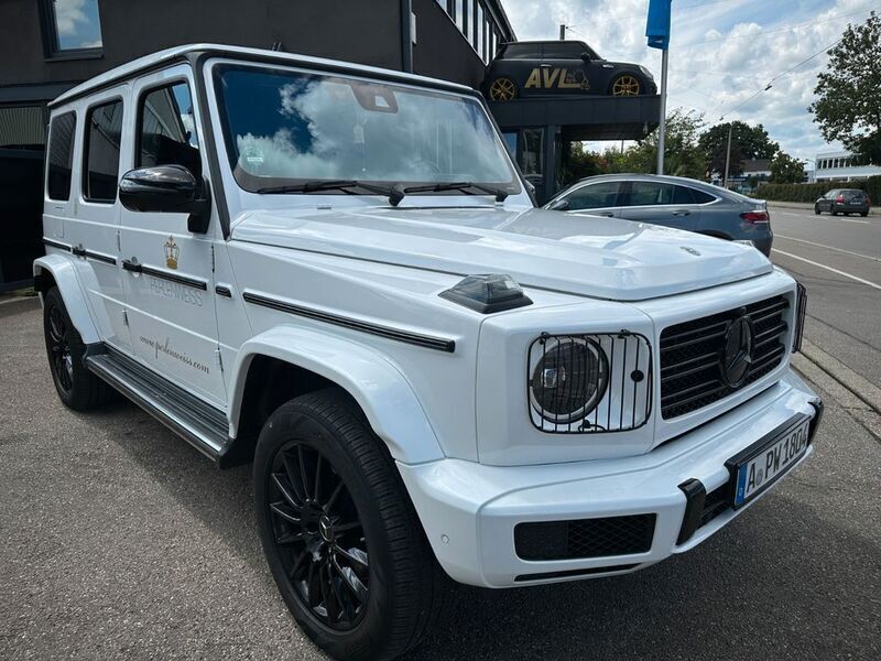 G manufaktur opalithweiss brig Gebraucht 2022 Mercedes G400 AMG line SUV | 128.699 € (Fairer Preis) - Bild 1/4