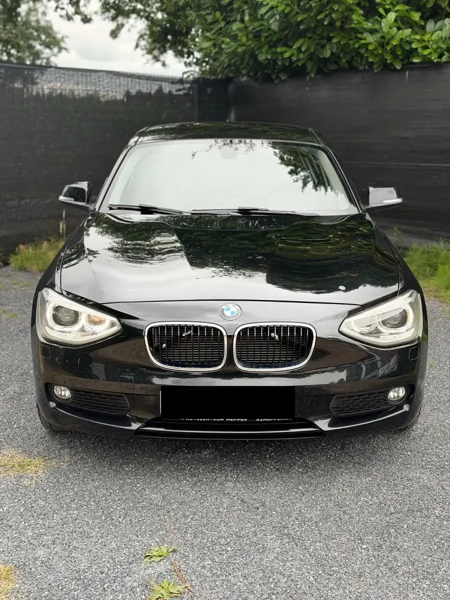 Gebraucht BMW 118 Sport Line 143 PS (105 kW) 2014 Schwarz Kleinwagen