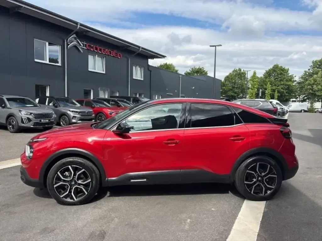 Gebraucht Citroën e-C4 Shine 100 kW (136 PS) 2023 Lackierung elixierrot/typ verkleidung a (metallic) Limousine